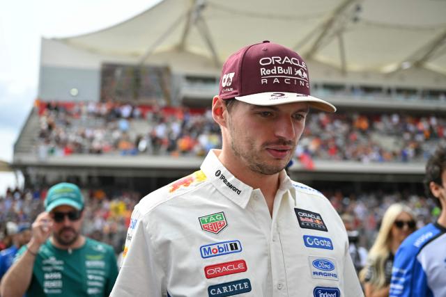 Red Bull Racing's Dutch driver Max Verstappen walks back toward the garages after taking part in the drivers' parade before the start of the United States Formula One Grand Prix at the Circuit of the Americas in Austin, Texas, on October 25, 2026. (Photo by ANGELA WEISS / AFP)