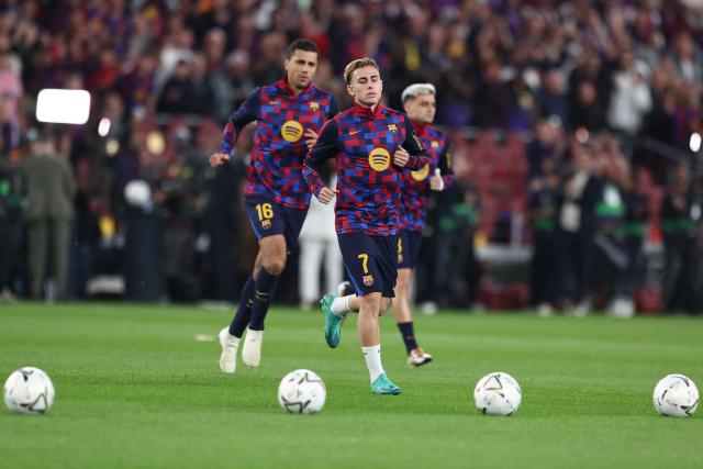 Barcelona's Spanish midfielder #07 Fermin Lopez warms up before the Spanish league football match between FC Barcelona and Real Madrid CF at Camp Nou Stadium in Barcelona on October 25, 2026. (Photo by Josep LAGO / AFP)