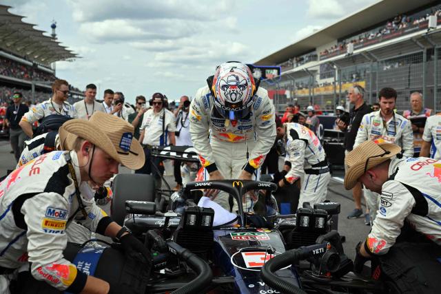 Red Bull Racing's Dutch driver Max Verstappen gets into his car on the starting grid before the start of the United States Formula One Grand Prix at the Circuit of the Americas in Austin, Texas, on October 25, 2026. (Photo by ANGELA WEISS / AFP)