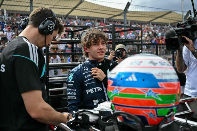 Mercedes' Italian driver Kimi Antonelli prepares to get into his car on the starting grid before the start of the United States Formula One Grand Prix at the Circuit of the Americas in Austin, Texas, on October 25, 2026. (Photo by ANGELA WEISS / AFP)