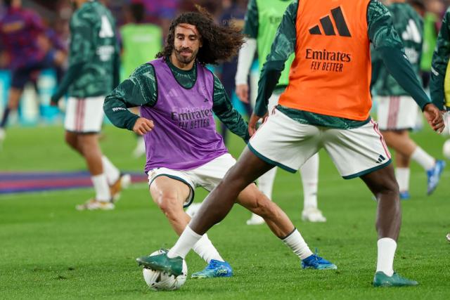 Real Madrid's Spanish defender #17 Marc Cucurella warms up before the Spanish league football match between FC Barcelona and Real Madrid CF at Camp Nou Stadium in Barcelona on October 25, 2026. (Photo by Lluis GENE / AFP)