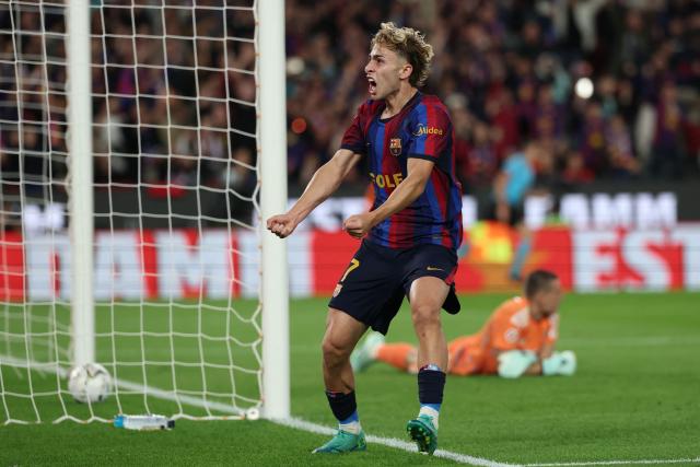 Barcelona's Spanish midfielder #07 Fermin Lopez celebrates their first goal scored by Barcelona's Brazilian forward #11 Raphinha (not pictured) during the Spanish league football match between FC Barcelona and Real Madrid CF at Camp Nou Stadium in Barcelona on October 25, 2026. (Photo by Lluis GENE / AFP)