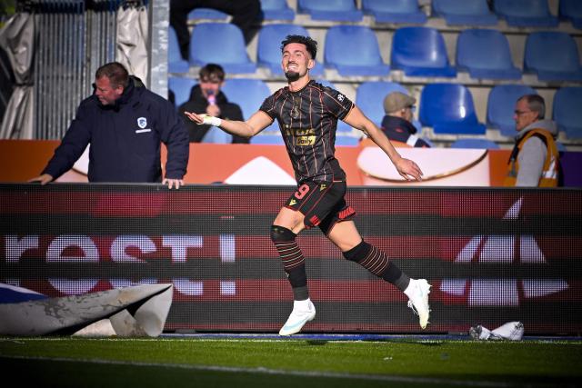 Standard Liege's Swiss forward #9 Andi Zeqiri celebrates after scoring a goal  during the Belgian "Pro League" First Division football match between KRC Genk and Standard Liege at Cegeka Arena in Genk on October 25, 2026. (Photo by Johan Eyckens / BELGA / AFP) / Belgium OUT