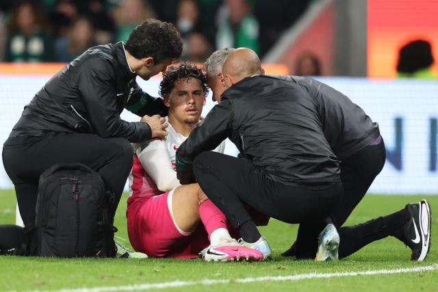 Sporting Lisbon's Uruguayan midfielder #20 Maximiliano Araujo receives medical assistance after colliding with Academico de Viseu's Brazilian goalkeeper #98 Ewerton during the Portuguese League football match between Sporting CP and Academico de Viseu FC at Jose Alvalade stadium in Lisbon on October 25, 2026. (Photo by PATRICIA DE MELO MOREIRA / AFP)