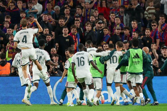 Real Madrid's French forward #10 Kylian Mbappe celebrates scoring his team's second goal during the Spanish league football match between FC Barcelona and Real Madrid CF at Camp Nou Stadium in Barcelona on October 25, 2026. (Photo by Lluis GENE / AFP)