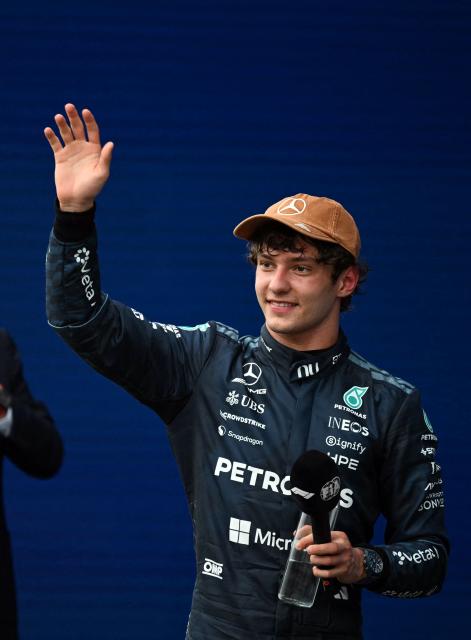 Mercedes' Italian driver Kimi Antonelli celebrates after winning the United States Formula One Grand Prix at the Circuit of the Americas in Austin, Texas, on October 25, 2026. (Photo by RONALDO SCHEMIDT / AFP)