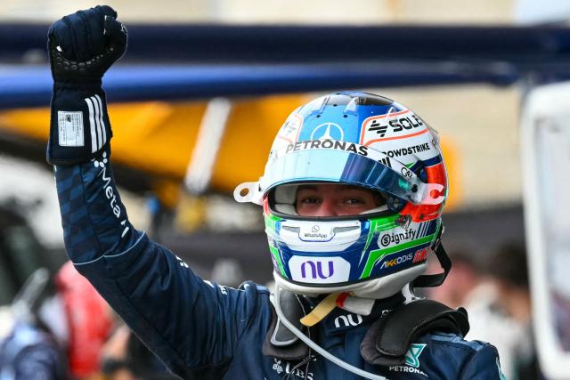 Mercedes' Italian driver Kimi Antonelli celebrates after winning the United States Formula One Grand Prix at the Circuit of the Americas in Austin, Texas, on October 25, 2026. (Photo by RONALDO SCHEMIDT / AFP)