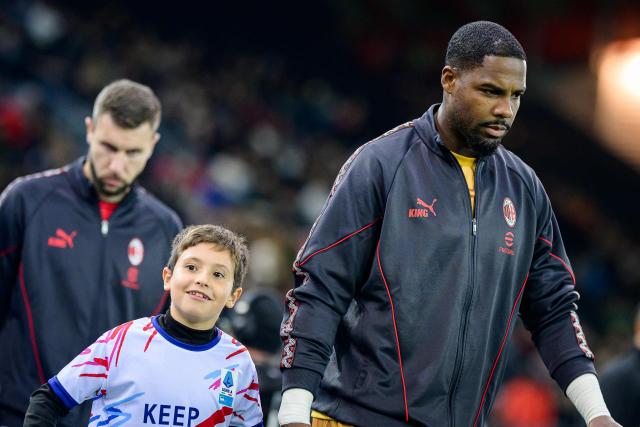 AC Milan's French goalkeeper #16 Mike Maignan enters the picth prior to the Italian Serie A football match between Udinese and Milan at the Stadio Friuli in Udine on October 25, 2026. (Photo by Jure Makovec / AFP)