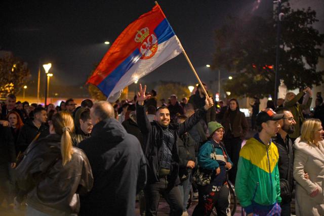 Citizens of Northern-Serbian city of Novi Sad celebrate in the streets after students movement declared victory of their candidates list at snap Parliamentary elections, on October 25, 2026. Voters cast ballots in record numbers on October 25, 2026, with the country recording its highest parliamentary election turnout in more than three decades. Celebrations erupted on the streets of the capital; passing cars honked their horns as crowds began to party at the news that Serbia's ruling party had lost parliamentary snap elections. (Photo by NENAD MIHAJLOVIC / AFP)