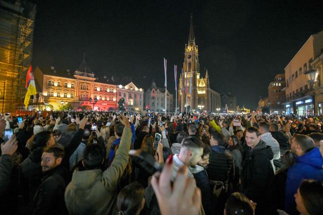 Citizens of Northern-Serbian city of Novi Sad celebrate in the streets after students movement declared victory of their candidates list at snap Parliamentary elections, on October 25, 2026. Voters cast ballots in record numbers on October 25, 2026, with the country recording its highest parliamentary election turnout in more than three decades. Celebrations erupted on the streets of the capital; passing cars honked their horns as crowds began to party at the news that Serbia's ruling party had lost parliamentary snap elections. (Photo by NENAD MIHAJLOVIC / AFP)