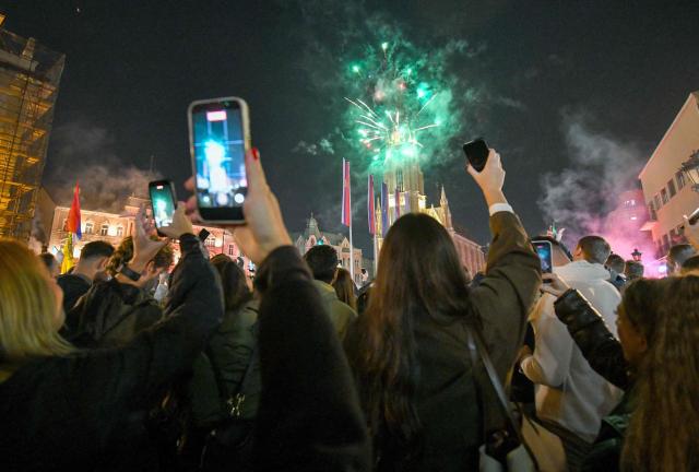 Citizens of Northern-Serbian city of Novi Sad celebrate in the streets after students movement declared victory of their candidates list at snap Parliamentary elections, on October 25, 2026. Voters cast ballots in record numbers on October 25, 2026, with the country recording its highest parliamentary election turnout in more than three decades. Celebrations erupted on the streets of the capital; passing cars honked their horns as crowds began to party at the news that Serbia's ruling party had lost parliamentary snap elections. (Photo by NENAD MIHAJLOVIC / AFP)