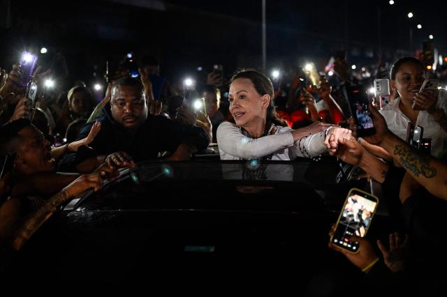 Venezuelan opposition leader and Nobel Peace Prize laureate Maria Corina Machado poses for a photo after her arrival in Caracas on October 25, 2026. Machado returned to her home country on October 25, 2026, after almost a year in exile, greeting ecstatic supporters at a church in the city of Barquisimeto. (Photo by Federico PARRA / AFP)