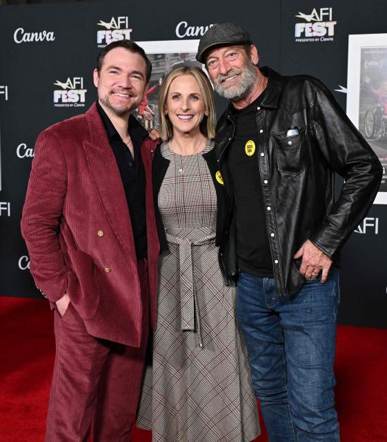 US actors Daniel Durant, Marlee Matlin and Troy Kotsur attend AFI Fest Closing Night Gala premiere of "Being Heumann" at the TCL Chinese Theatre in Los Angeles on October 25, 2026. AFI FEST, presented by the American Film Institute, runs from October 21 to 25, 2026. (Photo by LISA O'CONNOR / AFP)