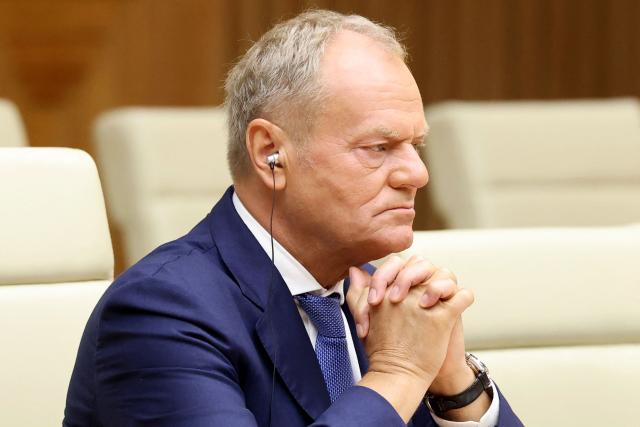 Poland's Prime Minister Donald Tusk attends a meeting with Vietnam's Prime Minister Le Minh Hung at the Government Office in Hanoi on October 26, 2026. (Photo by Quang Nguyen / AFP)