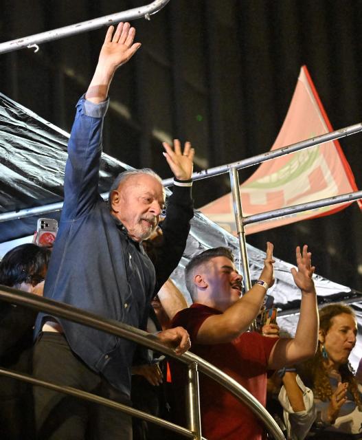 Brazil's President and presidential candidate Luiz Inacio Lula da Silva gestures to supporters after winning the presidential runoff election in Sao Paulo, Brazil, on October 26, 2026. Lula da Silva pulled off a dramatic comeback on October 25, 2026, as he clinched election victory against right-wing senator Flavio Bolsonaro, who trounced him in the first round. (Photo by Juan BARRETO / AFP)