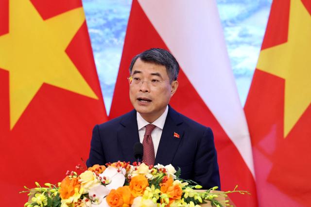 Vietnam's Prime Minister Le Minh Hung attends a press briefing with Poland's Prime Minister Donald Tusk at the Government Office in Hanoi on October 26, 2026. (Photo by Quang Nguyen / AFP)