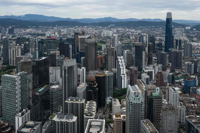 Commercial buildings are seen through clear skies as haze conditions due to Indonesian wildfires improve in Kuala Lumpur on October 26, 2026. The haze has sent air pollution levels surging to dangerous levels not only in Indonesia, but also in Malaysia, Singapore and East Timor, prompting the ASEAN regional bloc to call a meeting over the crisis. (Photo by Mohd Rasfan / AFP)