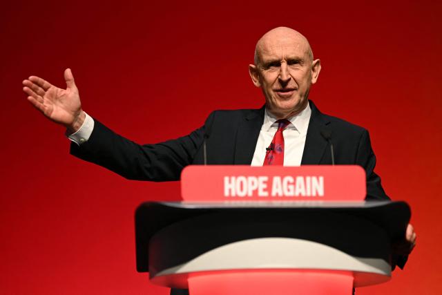 (FILES) Britain's Chancellor of the Exchequer John Healey delivers a speech on the second day of the annual Labour Party conference in Liverpool, north-west England, on September 28, 2026. British Prime Minister Andy Burnham's new government unveils its first budget on October 28, 2026, testing a commitment to ease the cost of living and ramp up defence spending with little financial room for manoeuvre. It could prove to be a tall order for Finance Minister John Healey as rising inflation and borrowing costs -- largely a consequence of the US-Iran war -- increase the government's debt pile and heap pressure on businesses and individuals. (Photo by Oli SCARFF / AFP)