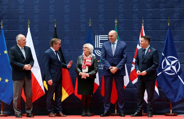 (From L) Poland's Defence State Secretary Pawel Zalewski, Germany's Defence Minister Boris Pistorius, France's Defence Minister Catherine Vautrin, Italy's Defence Minister Guido Crosetto and Britain's Defence Secretary Wes Streeting chat as they pose for the family picture ahead of a meeting of the E5, a five-country European defence and security cooperation group, at the French Defence Ministry in Paris, on October 26, 2026. (Photo by Thomas SAMSON / AFP)