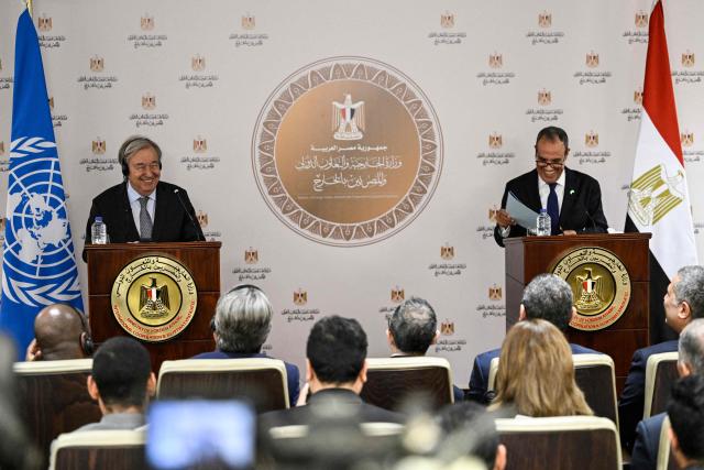 UN Secretary-General Antonio Guterres (L) shares a laugh with Egypt's Foreign Minister Badr Abdelatty during a news conference following their meeting in the New Administrative Capital on October 26, 2026. (Photo by Khaled DESOUKI / AFP)