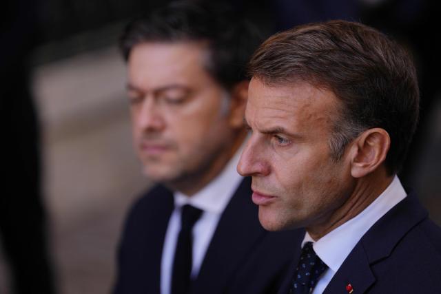EDITORS NOTE: Graphic content / France's President Emmanuel Macron (R) and the mayor of Marseille Benoit Payan (L) address media in Marseille, southern France on October 26, 2026, during a visit to notice the 'return of republican order' after the violence and looting that punctuated the citizen mobilization of October 17, 2026. Protests by high school students over learning conditions sparked a movement that has since spread nationwide, fuelled by broader anger over the rising cost of living. (Photo by Aurelien Morissard / POOL / AFP)