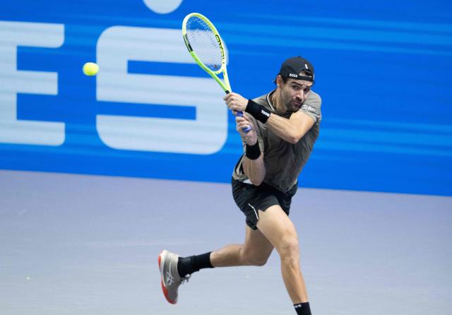 Italy’s Matteo Berrettini returns a ball to  Argentinas’ Tomas Martin Etcheverry (not in picture) during the Erste Bank Open 2026 ATP 500 tournament in Vienna, Austria on October 26, 2026. (Photo by Joe Klamar / AFP)