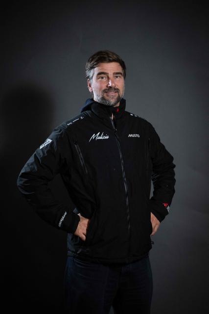 "Malizia 4" IMOCA class's German sailor Boris Herrmann poses for a photo session in Saint-Malo, western France on October 16, 2026, a few days ahead of the start of the 13th Route du Rhum - Destination Guadeloupe. From Saint-Malo in Brittany to Pointe-à-Pitre in Guadeloupe,115 skippers across 6 classes will take the start on November 1, 2026, in this solo transatlantic sailing race. (Photo by Martin BUREAU / AFP)