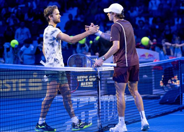 Czech Republic's Tomas Machac (L) congratulates Australia's Alex de Minaur (R) after losing their match at the Erste Bank Open 2026 ATP 500 tennis tournament in Vienna, Austria, on October 26, 2026. (Photo by Joe Klamar / AFP)