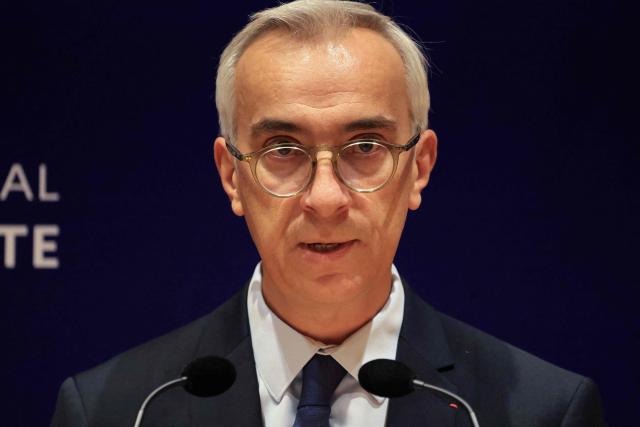 France's counter-terrorism public prosecutor Olivier Christen speaks during a press conference at the Paris Judicial Court, in Paris on October 26, 2026, following the terrorist attack that took place on October 23 in Trappes and La Verriere. French authorities have transferred to a psychiatric unit a man suspected of a gun attack in the Paris suburbs that killed one person and wounded five, prosecutors said on October 25, 2026. The man was detained on October 23 with a machine gun and tear-gas grenades in his car, shortly after the victims were shot as a vehicle drove through the towns of Trappes and La Verriere, west of Paris. (Photo by Ludovic MARIN / AFP)