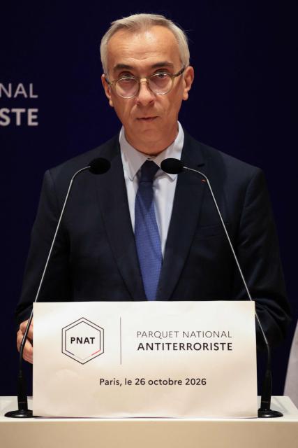 France's counter-terrorism public prosecutor Olivier Christen speaks during a press conference at the Paris Judicial Court, in Paris on October 26, 2026, following the terrorist attack that took place on October 23 in Trappes and La Verriere. French authorities have transferred to a psychiatric unit a man suspected of a gun attack in the Paris suburbs that killed one person and wounded five, prosecutors said on October 25, 2026. The man was detained on October 23 with a machine gun and tear-gas grenades in his car, shortly after the victims were shot as a vehicle drove through the towns of Trappes and La Verriere, west of Paris. (Photo by Ludovic MARIN / AFP)