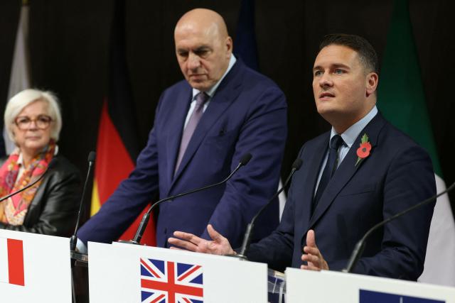 France's Defence Minister Catherine Vautrin (L), Italy's Defence Minister Guido Crosetto and Britain's Defence Secretary Wes Streeting attend a meeting of the E5, a five-country European defence and security cooperation group, at the French Defence Ministry in Paris, on October 26, 2026. (Photo by Thomas SAMSON / AFP)
