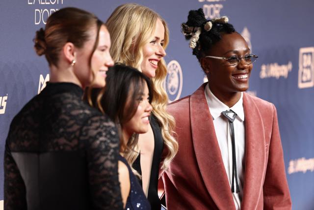 (L-R) Netherlands and Chelsea defender Veerle Buurman, Japan and Chelsea midfielder Manaka Matsukubo, England and Chelsea goalkeeper Hannah Hampton and France and Chelsea forward Melvine Malard pose upon their arrival to attend the 2026 Ballon d'Or France Football award ceremony at the Palladium Theatre in London on October 26, 2026. (Photo by Toby Shepheard / AFP)