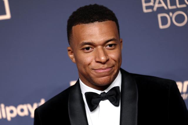 France and Real Madrid forward Kylian Mbappe poses upon their arrival to attend the 2026 Ballon d'Or France Football award ceremony at the Palladium Theatre in London on October 26, 2026. (Photo by Toby Shepheard / AFP)