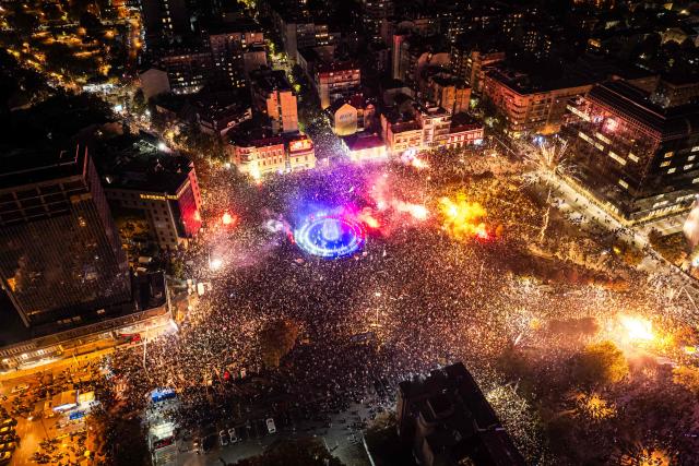 This aerial photograph shows supporters of the Students List gathering at Slavija Square as they celebrate their victory a day after Serbia's snap parliamentary elections, in Belgrade on October 26, 2026. A day after a seismic victory over Serbia's long-serving right-wing leader Aleksandar Vucic, a student-led movement faces the challenge of governing a country beset by problems.
The movement, which mobilised some of Serbia's largest crowds since Slobodan Milosevic fell in 2000, has pledged to tackle corruption, strengthen education and boost the economy.
But on Monday, little was known about the next steps of the student-backed list, made up of experts from various fields, most of them political novices. (Photo by DJORDJE KOSTIC / AFP)