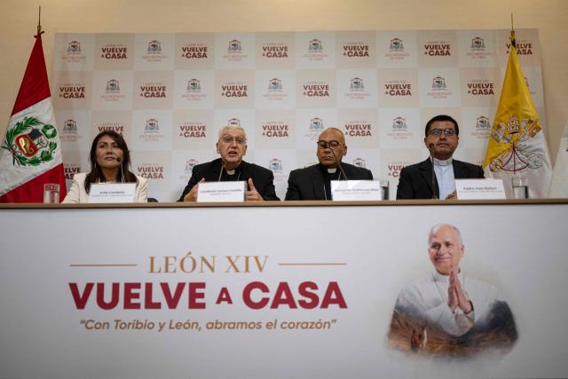 Lima Archbishop Cardinal Carlos Castillo (2nd L) speaks alongside Lima Auxiliary Bishop Monsignor Guillermo Elias (2nd R) during a press conference in Lima on October 26, 2026, to provide information on ticket registration and access procedures for the mass to be celebrated by Pope Leo XIV at Las Palmas Air Base on November 16, 2026. (Photo by ERNESTO BENAVIDES / AFP)