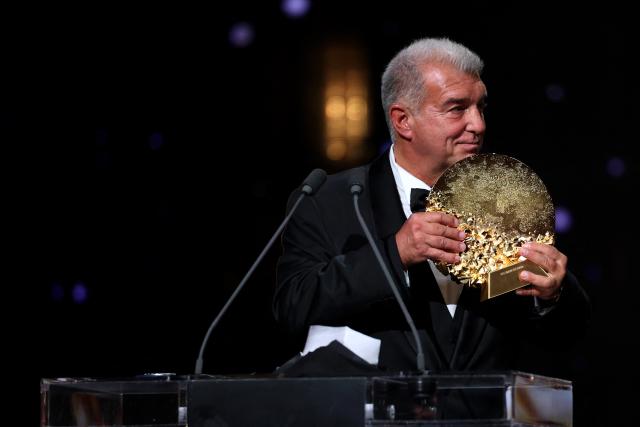 President of FC Barcelona Joan Laporta receives the "2026 Ballon d'Or Women's Club of the Year" trophy during the 2026 Ballon d'Or France Football award ceremony at the Palladium Theatre in London on October 26, 2026. (Photo by FRANCK FIFE / AFP)
