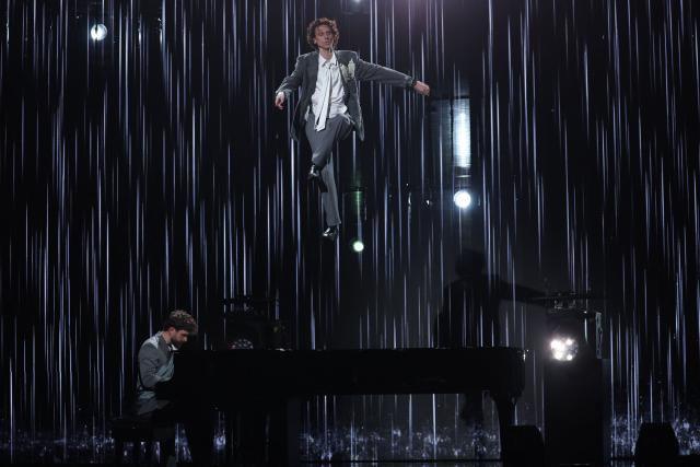Pianist Emilio Piano and French dancer Arthur Cadre perform during the 2026 Ballon d'Or France Football award ceremony at the Palladium Theatre in London on October 26, 2026. (Photo by FRANCK FIFE / AFP)
