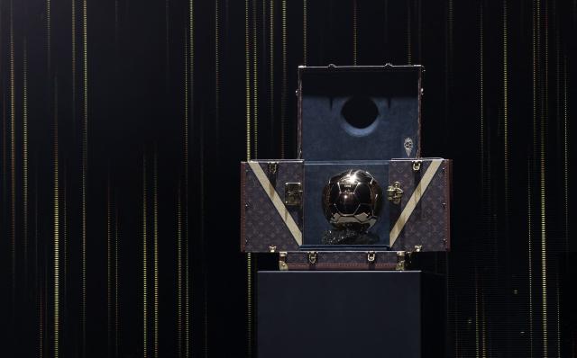 The trophy is revealed on stage during the 2026 Ballon d'Or France Football award ceremony at the Palladium Theatre in London on October 26, 2026. (Photo by FRANCK FIFE / AFP)