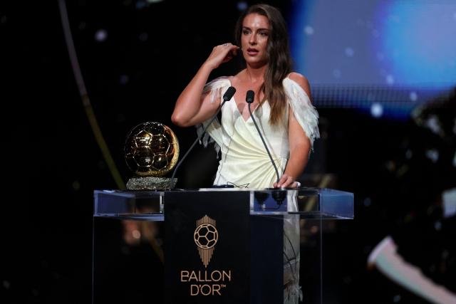 Spain and Barcelona midfielder Alexia Putellas delivers a speech after receiving the Ballon d'Or Feminin award for the best female footballer during the 2026 Ballon d'Or France Football award ceremony at the Palladium Theatre in London on October 26, 2026. (Photo by FRANCK FIFE / AFP)