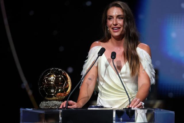 Spain and Barcelona midfielder Alexia Putellas delivers a speech after receiving the Ballon d'Or Feminin award for the best female footballer during the 2026 Ballon d'Or France Football award ceremony at the Palladium Theatre in London on October 26, 2026. (Photo by FRANCK FIFE / AFP)