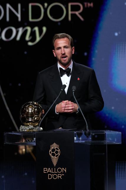 England and Bayern Munich forward Harry Kane delivers a speech after receiving the Ballon d'Or award for the best male footballer during the 2026 Ballon d'Or France Football award ceremony at the Palladium Theatre in London on October 26, 2026. (Photo by FRANCK FIFE / AFP)
