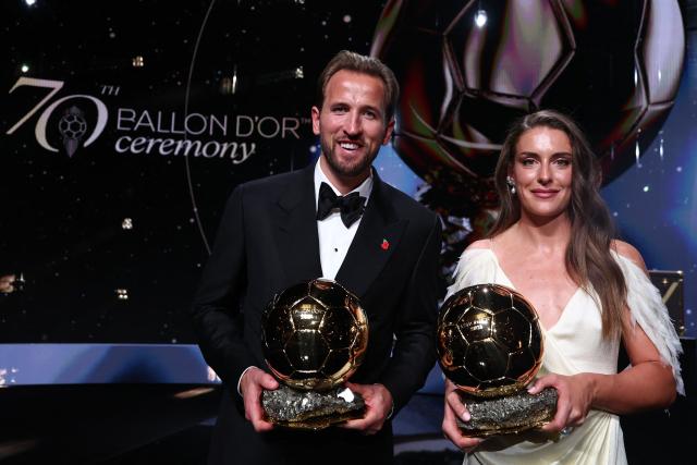 Spain and Barcelona midfielder Alexia Putellas and England and Bayern Munich forward Harry Kane pose with their trophies on stage after receiving their Ballon d'Or awards for the best female and male footballer during the 2026 Ballon d'Or France Football award ceremony at the Palladium Theatre in London on October 26, 2026. (Photo by FRANCK FIFE / AFP)