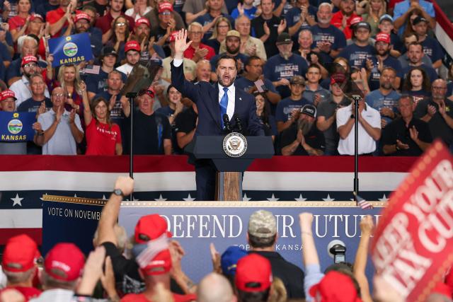 US Vice President JD Vance speaks during a midterm campaign rally in Topeka, Kansas on October 26, 2026. Vance is campaigning for US Senator Roger Marshall (R-KS). (Photo by Finn Gomez / POOL / AFP)