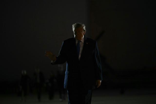US President Donald Trump walks to board Air Force One at Frederick W. Smith International Airport in Memphis, Tennessee on October 26, 2026. President Trump is returning to Washington, DC after speaking at a midterm campaign rally in Mississippi. (Photo by Kent NISHIMURA / AFP)