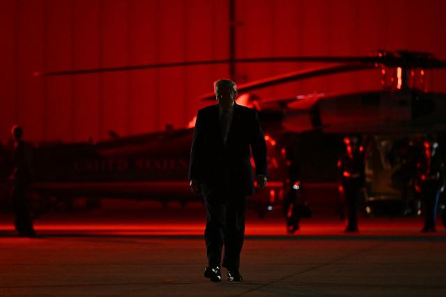 US President Donald Trump walks to board Air Force One at Frederick W. Smith International Airport in Memphis, Tennessee on October 26, 2026. President Trump is returning to Washington, DC after speaking at a midterm campaign rally in Mississippi. (Photo by Kent NISHIMURA / AFP)