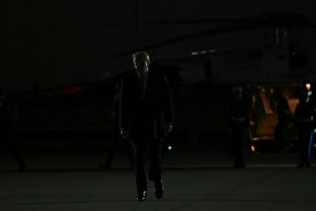 US President Donald Trump walks to board Air Force One at Frederick W. Smith International Airport in Memphis, Tennessee on October 26, 2026. President Trump is returning to Washington, DC after speaking at a midterm campaign rally in Mississippi. (Photo by Kent NISHIMURA / AFP)