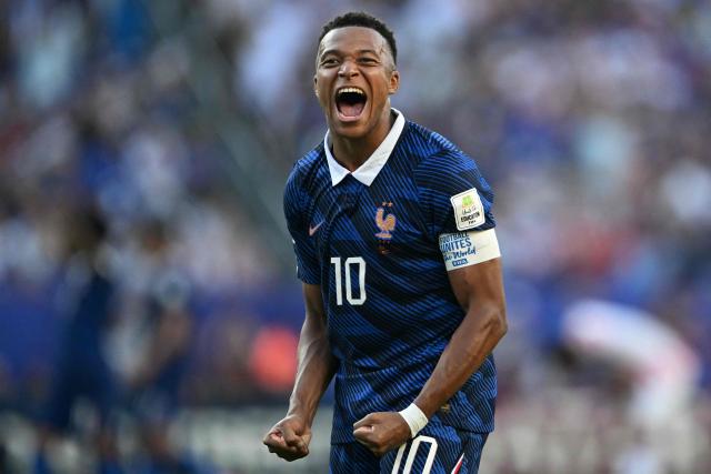 (FILES) France's forward #10 Kylian Mbappe celebrates after winning the 2026 World Cup round of 16 football match between Paraguay and France at the Philadelphia Stadium in Philadelphia on July 4, 2026. China's biggest energy drink brand said October 27, 2026 it has cancelled a partnership with Kylian Mbappe after a video circulated online in which the French football star apparently joked about former leader Mao Zedong. (Photo by MAURO PIMENTEL / AFP)