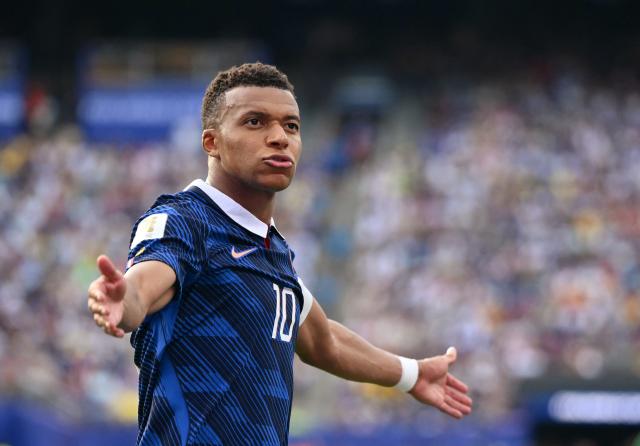 (FILES) France's forward #10 Kylian Mbappe reacts during the 2026 World Cup round of 32 football match between France and Sweden at the New York/New Jersey Stadium in East Rutherford on June 30, 2026. China's biggest energy drink brand said October 27, 2026 it has cancelled a partnership with Kylian Mbappe after a video circulated online in which the French football star apparently joked about former leader Mao Zedong. (Photo by ANGELA WEISS / AFP)