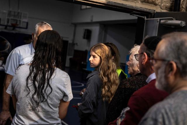 Voters wait in line at a polling station in Jerusalem on October 27, 2026, on the day of Israel's legislative election. A deeply divided Israel heads to the polls on October 27 for the first time since Hamas's October 7, 2023 attack, with voters delivering their verdict on veteran Prime Minister Benjamin Netanyahu and the country's rightward drift. (Photo by John WESSELS / AFP)