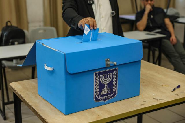Yousef Jabareen, leader of Israel's Arab-led Joint List political alliance, casts his ballot to vote at a polling station in the Arab-Israeli town of Umm al-Fahm on October 27, 2026, on the day of Israel's legislative election. Israelis began voting on October 27 in the first general election since Hamas's October 7, 2023 attack, with voters to deliver their verdict on Prime Minister Benjamin Netanyahu and the country's rightward drift. (Photo by AHMAD GHARABLI / AFP)